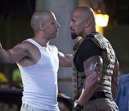 Vin Diesel y Dwayne Johnson durante una escena de Fast Five. (Prensa Asociada / Universal Pictures)