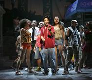 (NYT48) NEW YORK -- May 13, 2008 -- TONY-NOMINEES --Lin-Manuel Miranda, center, as Uanavi in the musical "In the Heights" at the Richard Rodgers Theater in Manhattan, Feb. 13, 2008. "In the Heights," a rap, hip-hop and salsa flavored musical about Latino families in Washington Heights, led the Tony nominations, which were announced on Tuesday morning, May 13, 2008 with 13 nods, including two for Lin-Manuel Miranda, the show's 28-year-old creator and star. (Sara Krulwich/The New York Times)