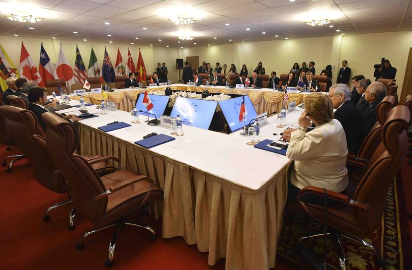 El asiento vacío, en primer plano, del premier canadiense Justin Trudeau puede verse durante una reunión del Acuerdo de Asociación Transpacífico (TPP, por sus siglas en inglés), en las márgenes de la cumbre de la Asociación de Cooperación Económica Asia-P
