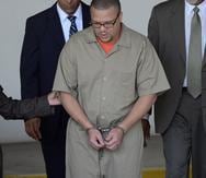 Alexis Candelario Santana enfrenta 40 cargos criminales, 38 de los cuales están relacionados con la matanza del 16 de octubre de 2009 en el negocio "La Tómbola" en Toa Baja.