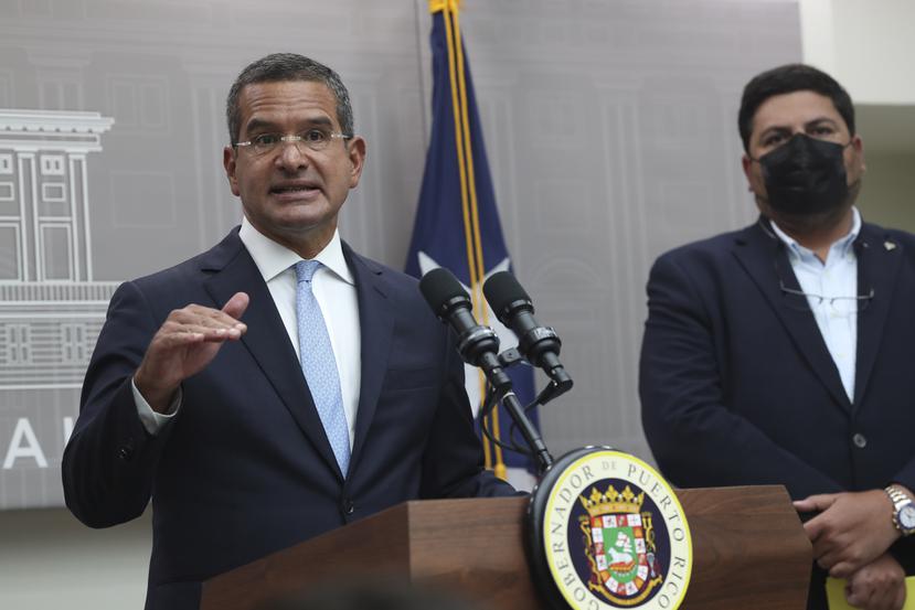 El gobernador Pedro Pierluisi y el secretario del Departamento de Salud, Carlos Mellado.