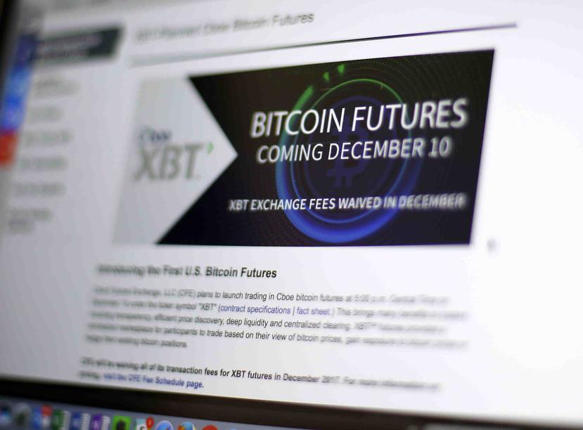 En esta imagen muestra el sitio web de la Chicago Board Options Exchange (CBOE), en la que anuncia que comenzarán las operaciones de futuros de Bitcoins. (AP)