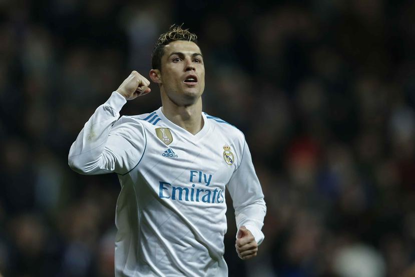 Cristiano Ronaldo celebra luego de anotar un gol contra el Real Sociedad. (AP)