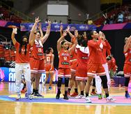 En esta foto de archivo, la selección nacional femenina de baloncesto celebra su primer triunfo en un Campeonato Mundial de FIBA.