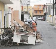 Parte de la calle Lealtad, en Santurce, estaba ocupada por escombros y material vegetativo el pasado 8 de noviembre.