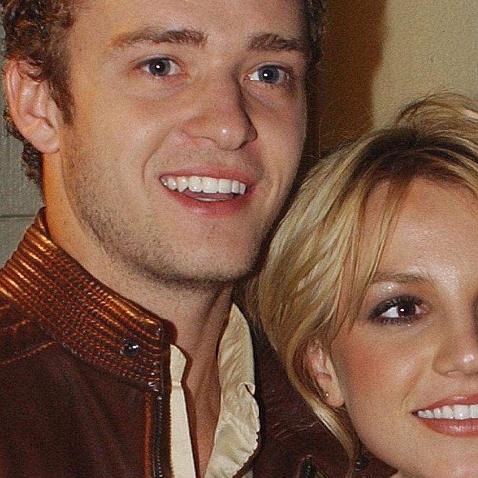 FILE-- Justin Timberlake of 'NSYNC and Britney Spears pose for photographers at the album release party for Britney's new album "Britney," in this Nov. 6, 2001 file photo, in New York. (AP Photo/Louis Lanzano, file)