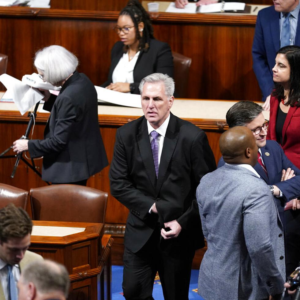 Rep. Kevin McCarthy, R-Calif., walks on the floor after the House voted to adjourn for the evening in the House chamber as the House meets for a second day to elect a speaker and convene the 118th Congress in Washington, Wednesday, Jan. 4, 2023. (AP Photo/Andrew Harnik)