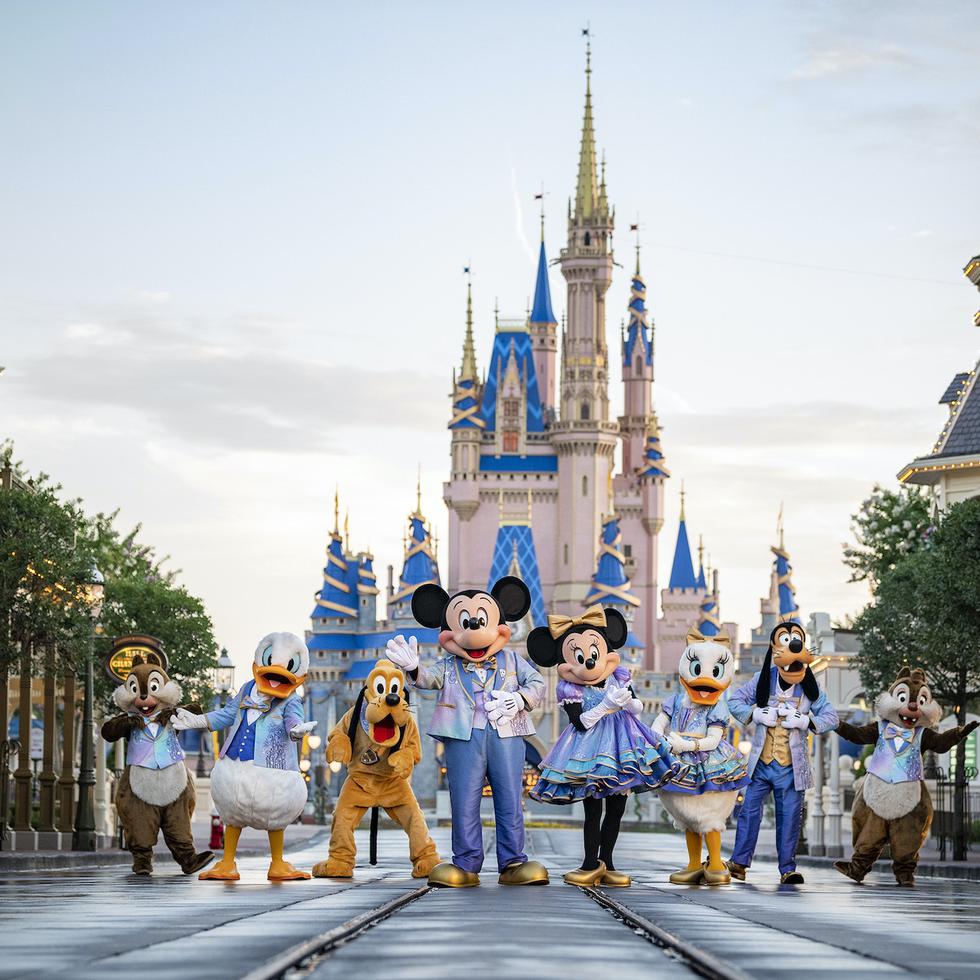 Beginning Oct. 1, 2021, Mickey Mouse and Minnie Mouse will host “The World’s Most Magical Celebration” honoring the 50th anniversary of Walt Disney World Resort in Lake Buena Vista, Fla. Mickey and Minnie will be joined by their best pals Donald Duck, Daisy Duck, Goofy, Pluto and Chip ‘n’ Dale all dressed in sparkling new looks, custom-made for the 18-month event, highlighted by embroidered impressions of Cinderella Castle on multi-toned, EARidescent fabric punctuated with pops of gold. (Matt Stroshane, photographer)  