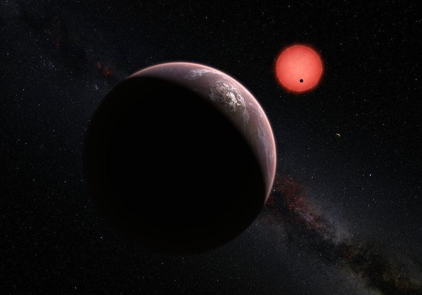 Como esta estrella está tan cercana y es tan poco luminosa, los astrónomos pueden estudiar la atmósfera de los tres planetas y, eventualmente, buscar indicios posibles de vida. (NASA)