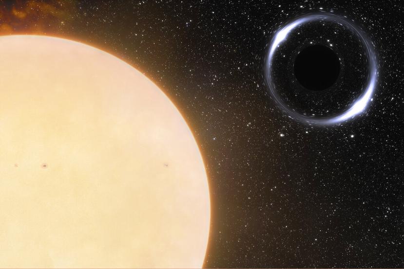 Esta ilustración proporcionada por NOIRLab en noviembre de 2022 muestra el agujero negro más cercano a la Tierra y su estrella compañera similar al Sol. (International Gemini Observatory/NOIRLab/NSF/AURA/J. da Silva/Spaceengine/M. Zamani via AP)