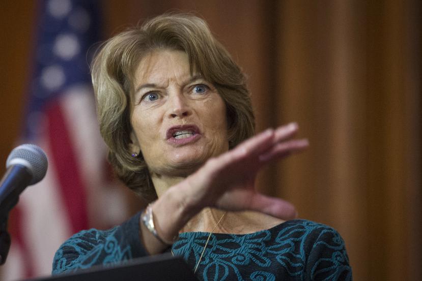 FILE - In this Tuesday, Dec. 11, 2018 file photo, Sen. Lisa Murkowski, R-Alaska, speaks after an order withdrawing federal protections for countless waterways and wetland was signed, at EPA headquarters in Washington. U.S. Sen. Lisa Murkowski says she is likely to support a resolution of disapproval over President Donald Trump's declaration of a national emergency to secure more money for a wall on the U.S.-Mexico border, Friday, Feb. 22, 2019. (AP Photo/Cliff Owen, File)
