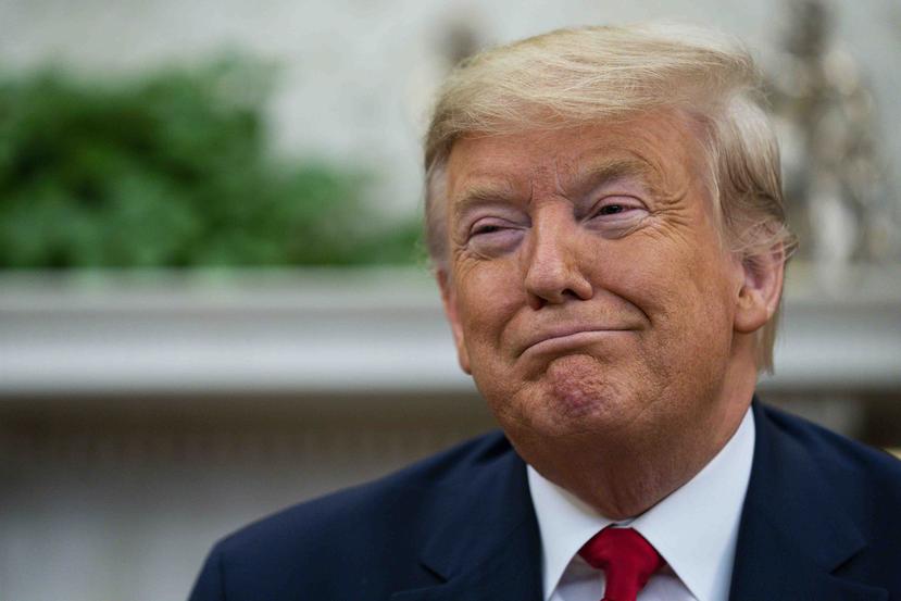 El presidente Donald Trump sonríe durante un encuentro con el mandatario ecuatoriano Lenín Moreno en la Oficina Oval de la Casa Blanca, el miércoles 12 de febrero de 2020, en Washington. (AP/Evan Vucci)