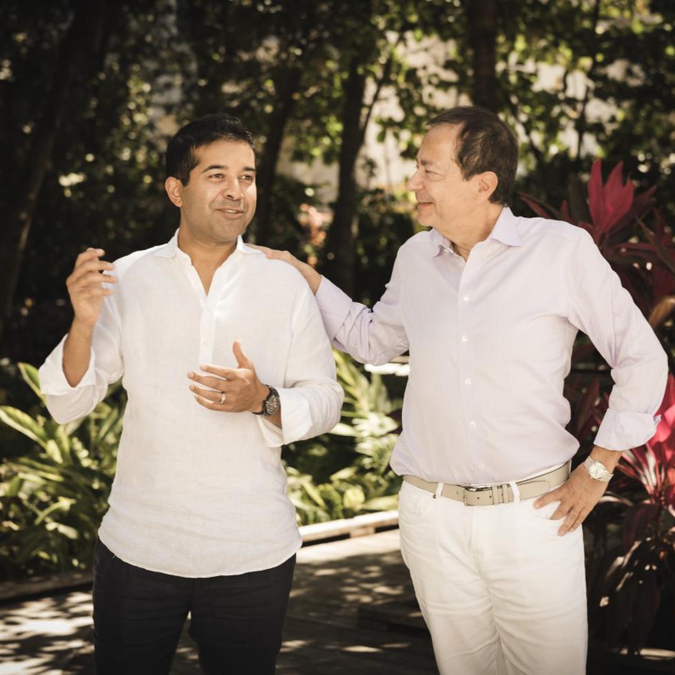 Fahad Ghaffar with his former partner John Paulson in a photo distributed in 2022.