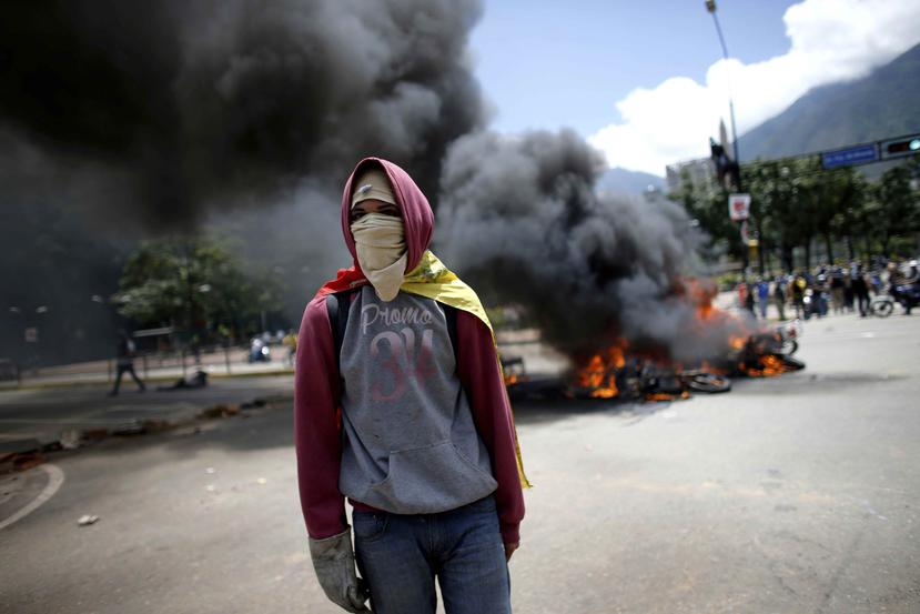 Un manifestante en Caracas. (AP)