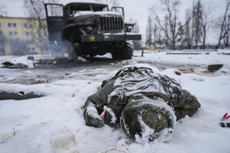 Body of a fallen soldier near a Russian missile launcher.