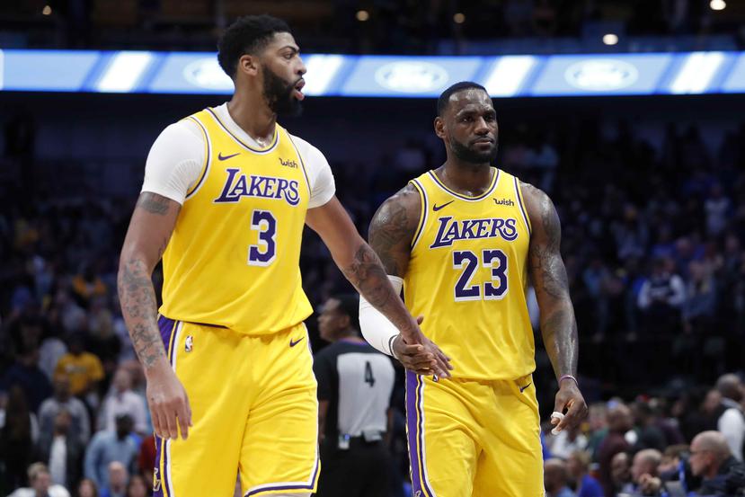 Anthony Davis y LeBron James tienen a los Lakers en el tope de los standings. (AP)