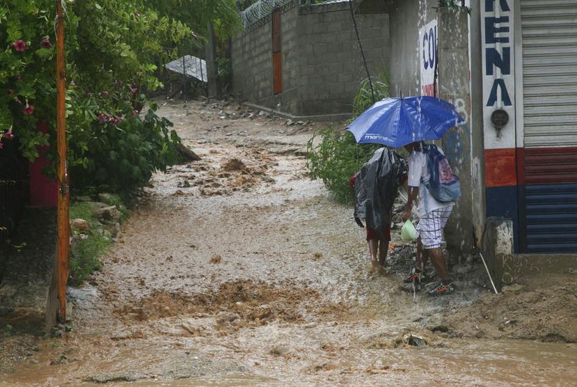 Las lluvias han afectado 834 viviendas en la República Dominicana (AP).