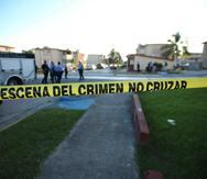 Imagen de archivo de un crimen violento ocurrido en el residencial en Ponce.