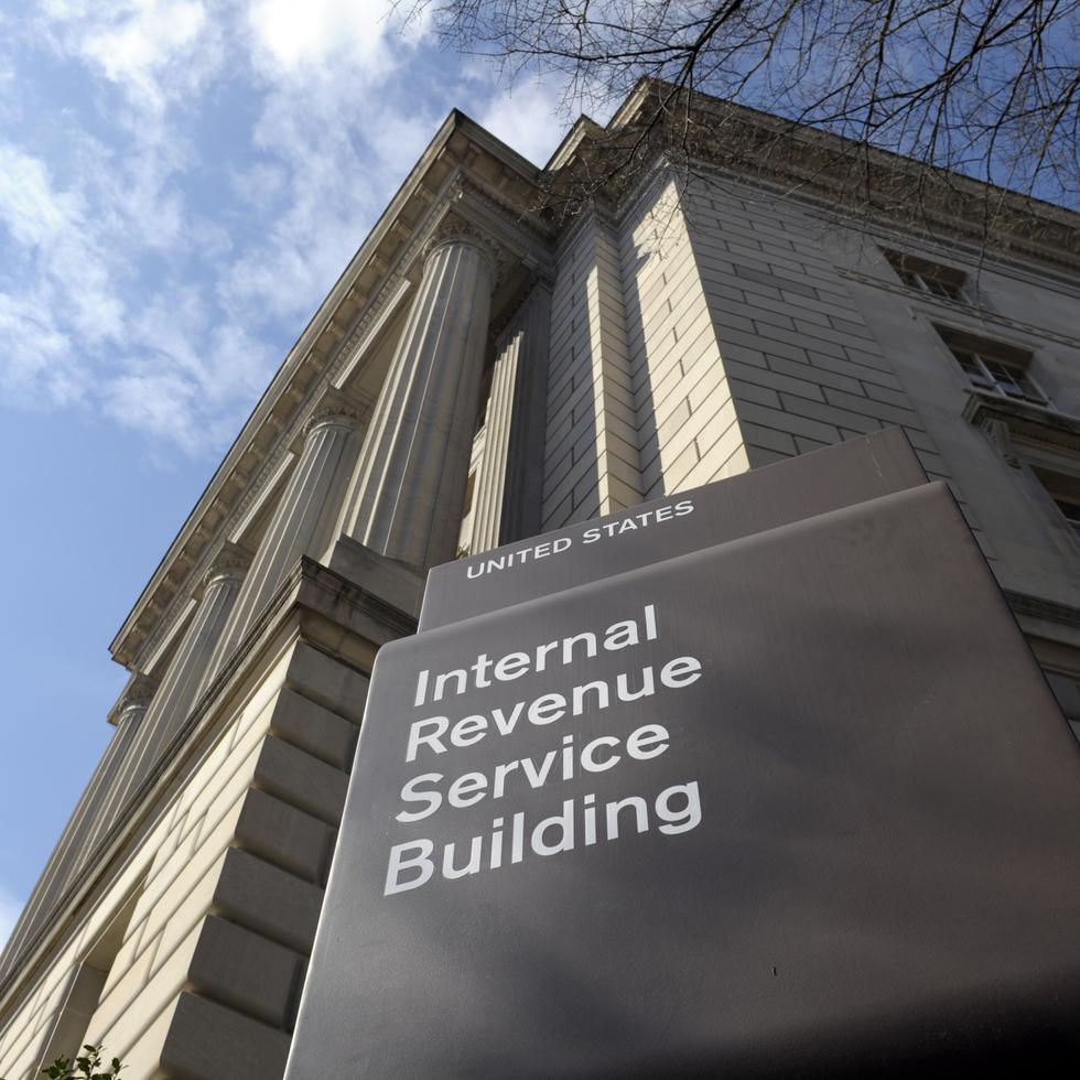 This photo taken March 22, 2013, shows the exterior of the Internal Revenue Service (IRS) building in Washington. The IRS issued $4 billion in fraudulent tax refunds last year to people using stolen identities, with some of the money going to addresses in Bulgaria, Lithuania and Ireland, according to a Treasury report released Thursday. The IRS sent a total of 655 tax refunds to a single address in Lithuania, and 343 refunds went to a lone address in Shanghai. (AP Photo/Susan Walsh)
