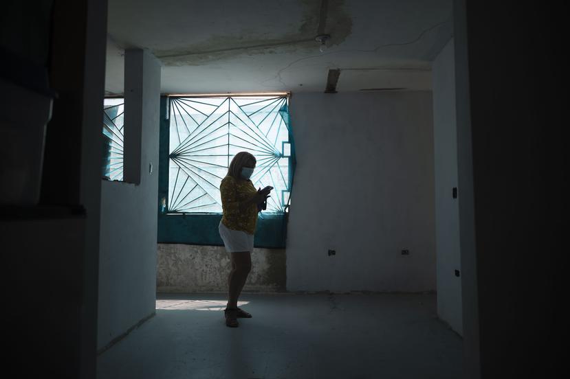 Eneida García at the house they bought as a shelter. A property that had been classified as a public nuisance. 
