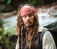 In this film publicity image released by Disney, Johnny Depp portrays Captain Jack Sparrow in a scene from, "Pirates of the Caribbean: On Stranger Tides." (AP Photo/Disney, Peter Mountain)