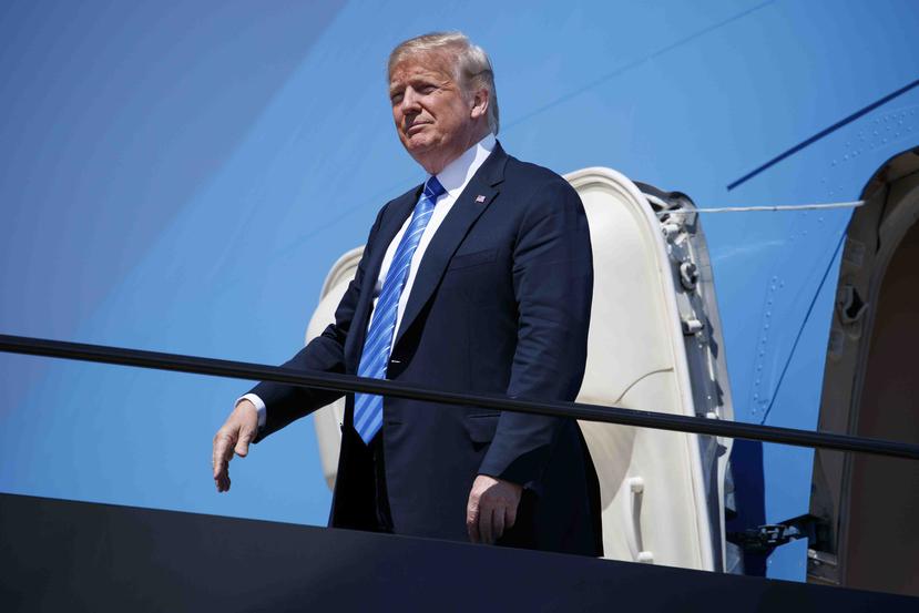 Donald Trump arriba al aeropuerto de Kansas City el martes, 24 de julio del 2018. (AP)