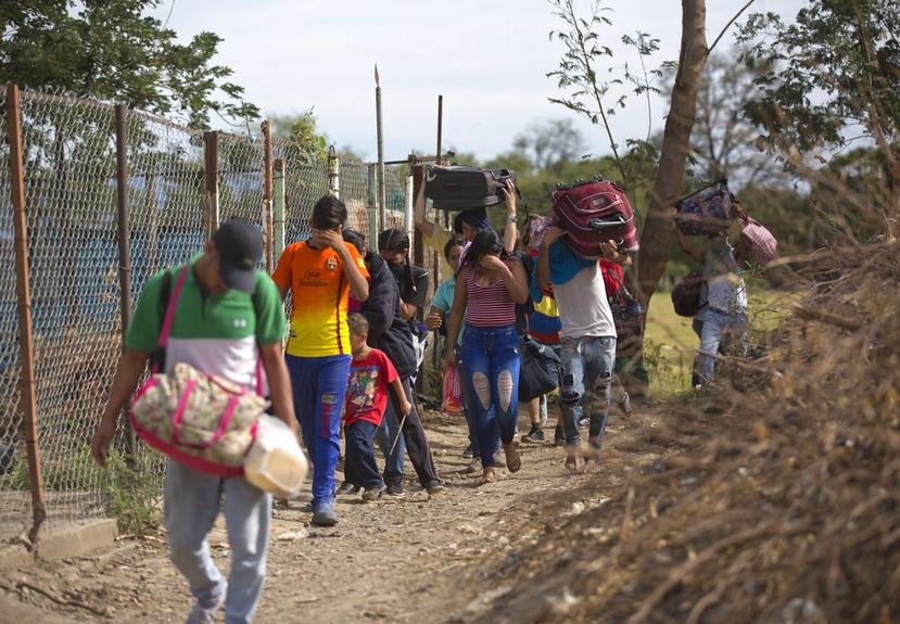 La frontera entre Colombia y Venezuela se ha convertido en un sitio peligroso para los inmigrantes venezolanos. (AP)
