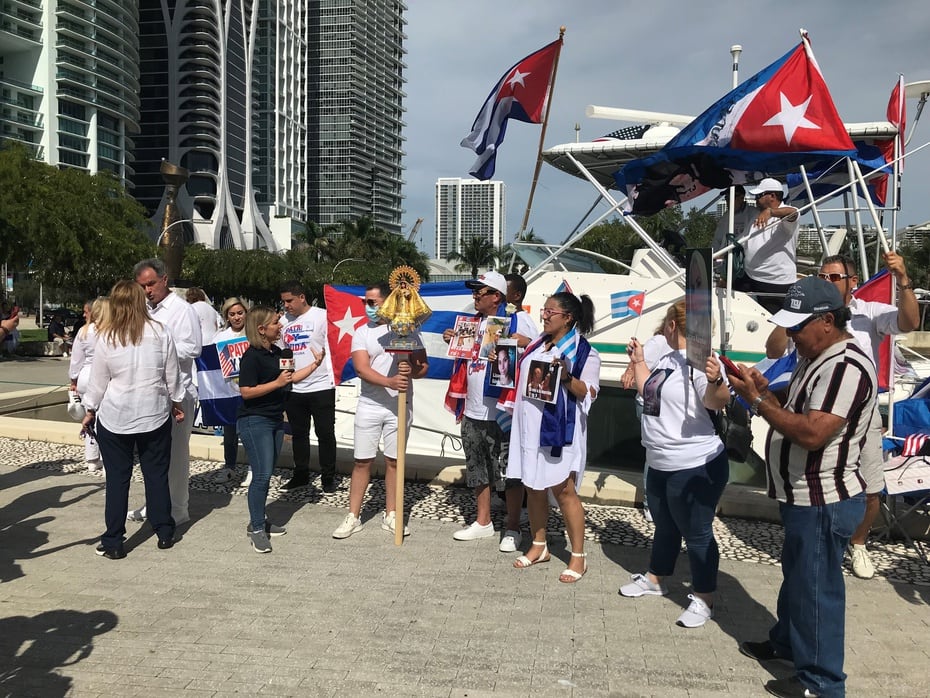Protesters headed to Maurice A. Ferre Park via a motorcade of cars from Tamiami Park and boats in Biscayne Bay in solidarity with protests in the island nation, including the "Civic March for Change" of Monday.