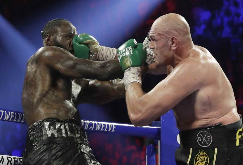 En foto de archivo del 22 de febrero del 2020 Tyson Fury enfrenta a Deontay Wilder por el título de peso pesado de la Consejo Mundial de Boxeo en Las Vegas. (AP)