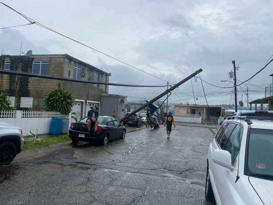 A utility pole that fell down due to strong hurricane winds.