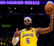 Los Angeles Lakers forward LeBron James gestures after passing Kareem Abdul-Jabbar to become the NBA's all-time leading scorer during the second half of an NBA basketball game against the Oklahoma City Thunder Tuesday, Feb. 7, 2023, in Los Angeles.