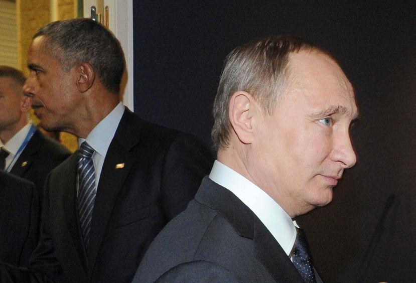 El presidente de Rusia, Vladimir Putin, y el presidente de EE.UU., Barack Obama, se reunieron hoy en París. (Mikhail Klimentyev / Sputnik / via AP)
