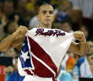 Carlos Arroyo celebra la impresionante victoria de Puerto Rico sobre Estados Unidos 92-73 en los Juegos Olímpicos de 2004 en Atenas.