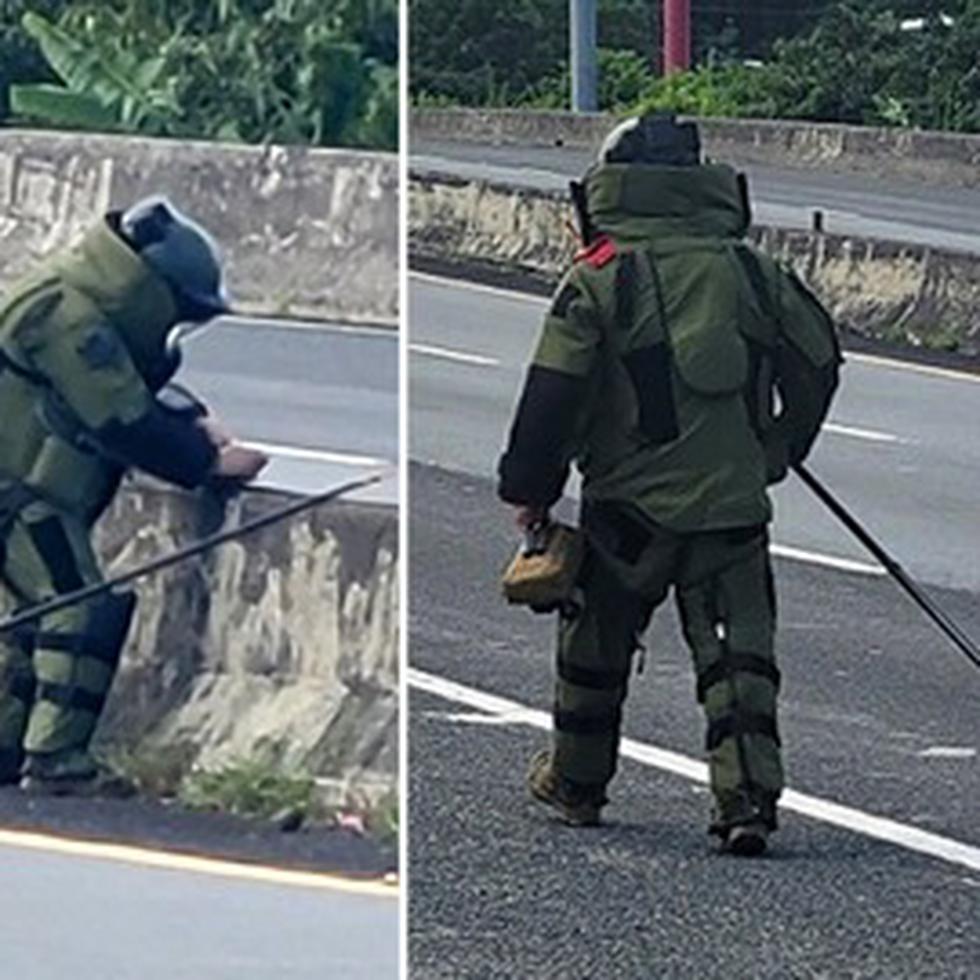 Momento en que un agente de la Divisón de Explosivos recoge una granada en el expreso Luis A. Ferré (PR-52) en Caguas.