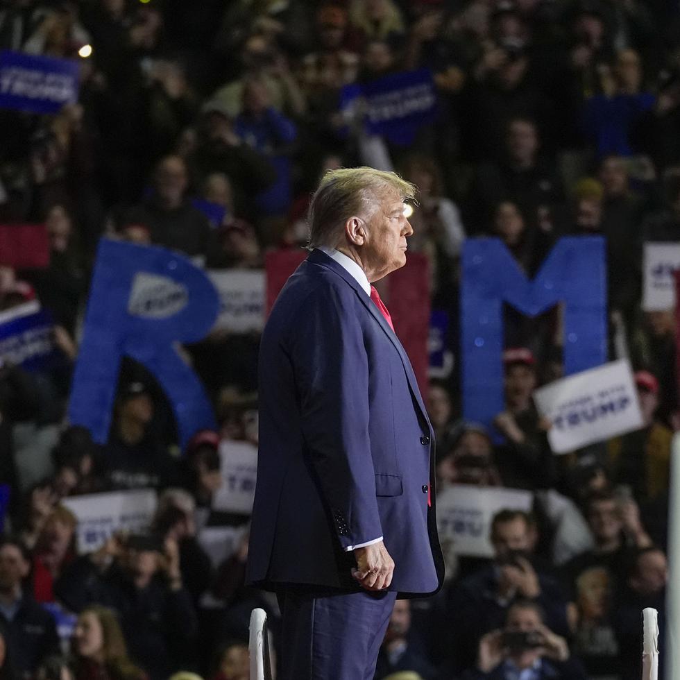 Republican presidential candidate former President Donald Trump on stage during a campaign event in Manchester, N.H., Saturday, Jan. 20, 2024. (AP Photo/Matt Rourke)