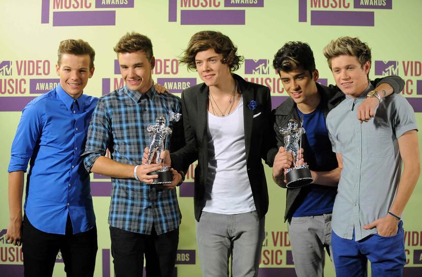 Harry Styles (centro) es la figura principal del grupo.
