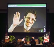 Edward Snowden fue acusado bajo la Ley de Espionaje de Estados Unidos y actualmente vive en Rusia para evitar ser detenido por las autoridades estadounidenses. (AP / Marco García)