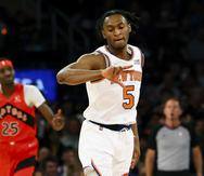 El base de los Knicks de Nueva York Immanuel Quickley tras encestar un triple en el encuentro ante los Raptors de Toronto.