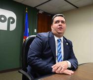 El secretario del DTOP, Carlos Contrera, evalúa cancelar el contrato por la administración del AutoExpreso. (GFR Media)