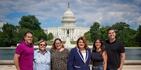 The group of statehood lobbyists poses with the Jenniffer González in front of the federal Capitol in Washington D.C.
