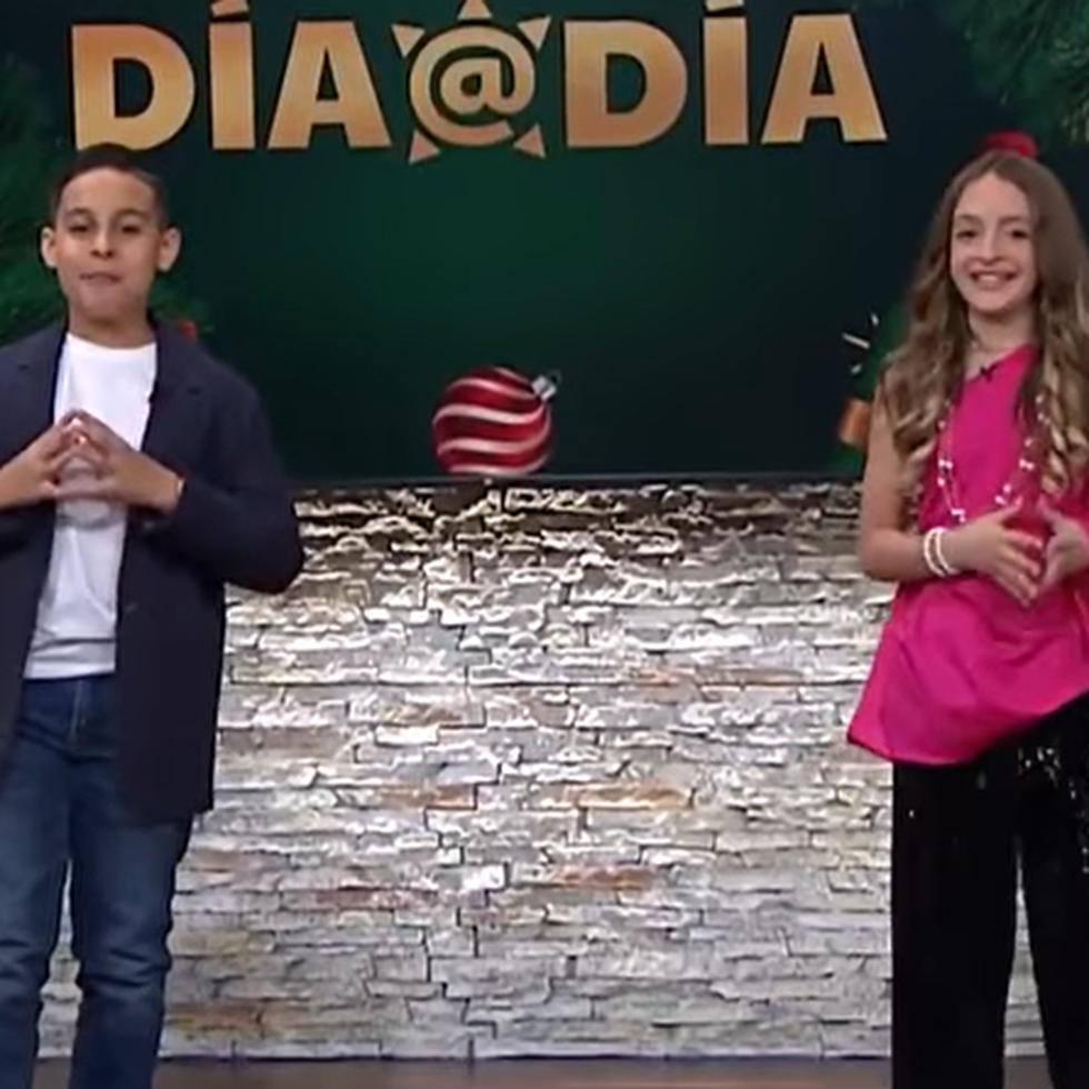Niños imitan a Víctor Santiago y a Dagmar Rivera.