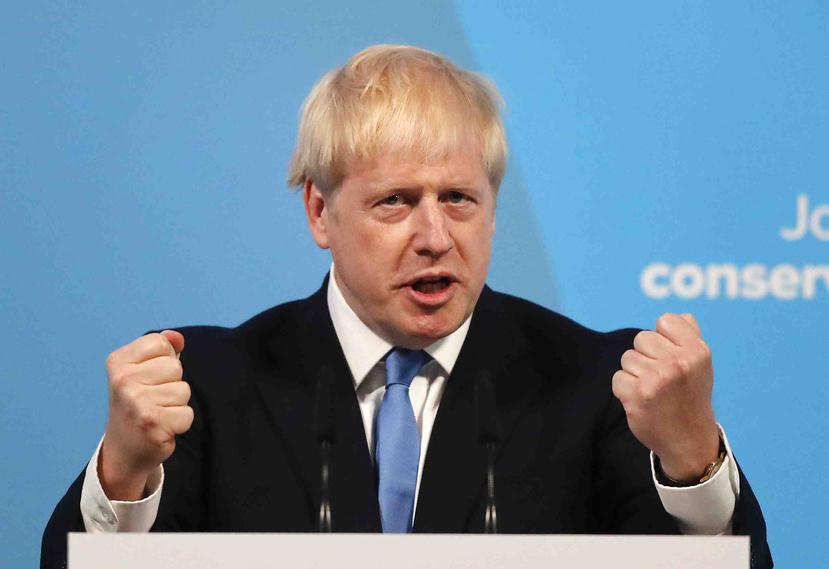 Boris Johnson se dirige al público luego de ser seleccionado como nuevo líder del Partido Conservador. (AP)