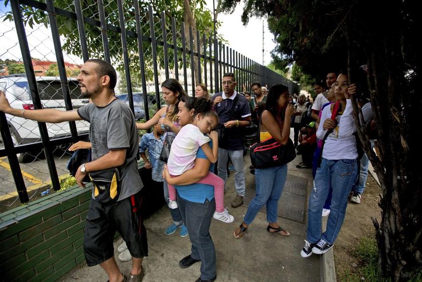 El ritmo diario promedio de salidas de venezolanos de su país durante 2018 ha sido de 5,500 personas. (AP)