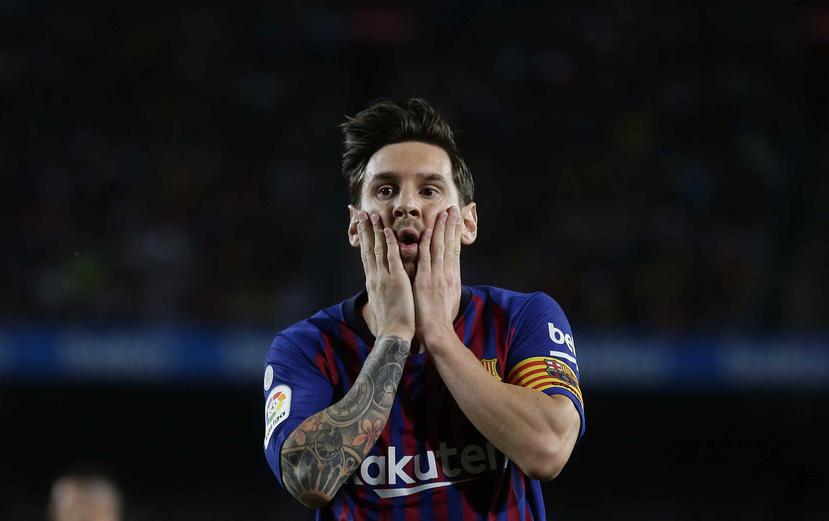 Lionel Messi reacciona despue's de fallar un disparo contra el Girona el domingo pasado. (AP)