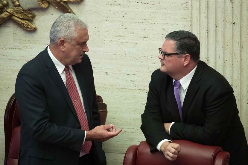 Los presidentes del PNP y del PPD, Thomas Rivera Schatz y Aníbal José Torres.