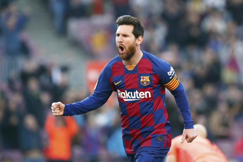 Lionel Messi del Barcelona celebra tras anotar el primer tanto del cuadro en el partido de La Liga Española contra el Eibar. (AP)