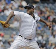 El abridor CC Sabathia lanza por los Yankees de Nueva York en duelo con los Vigilantes de Texas. (AP / Seth Wenig)