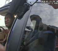 In this image from police body cam video, a Minneapolis police officer approaches George Floyd with a gun drawn, on May 25, 2020, outside Cup Foods in Minneapolis, as it is shown Wednesday, March 31, 2021, in the trial of former Minneapolis police Officer Derek Chauvin, in Floyd's death, at the Hennepin County Courthouse in Minneapolis. (Court TV via AP, Pool)