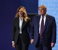 Melania y Donald Trump durante el primer debate presidencial.
