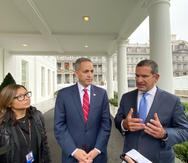 The director of the White House Office of Intergovernmental Affairs, Julie Chávez Rodríguez; Federal Undersecretary of Commerce Don Graves and Puerto Rico Governor Pedro Pierluisi participate in a meeting at the White House.
